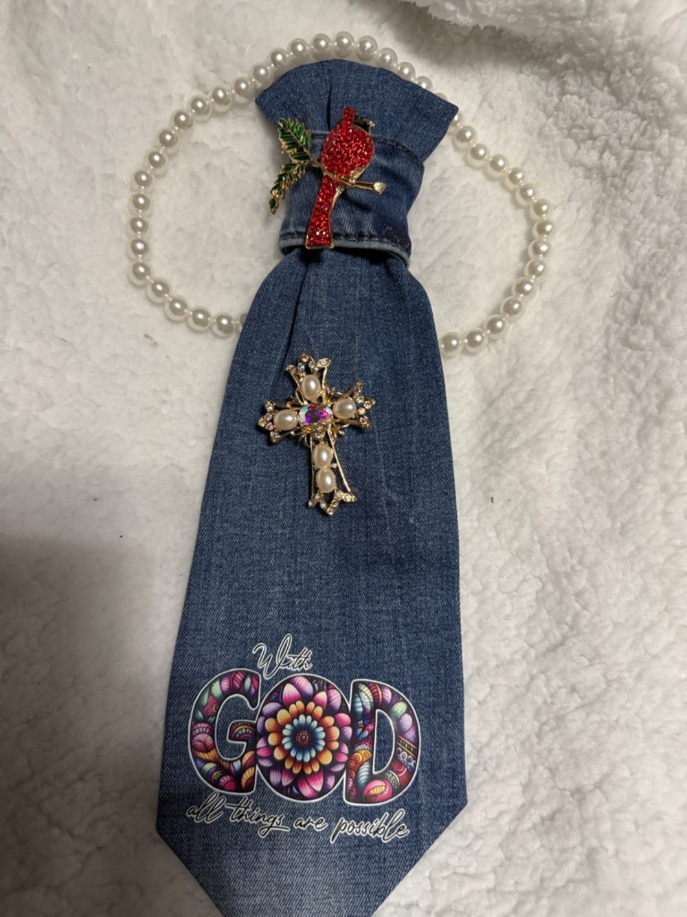 Denim Tie Necklace with Colorful 'GOD' Graphic and Decorative Brooches